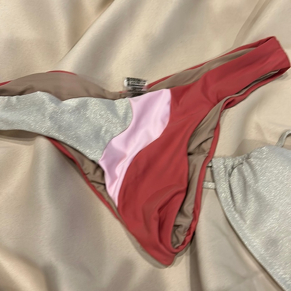 Low rise bottoms and bandeau top. Worn once and in excellent condition